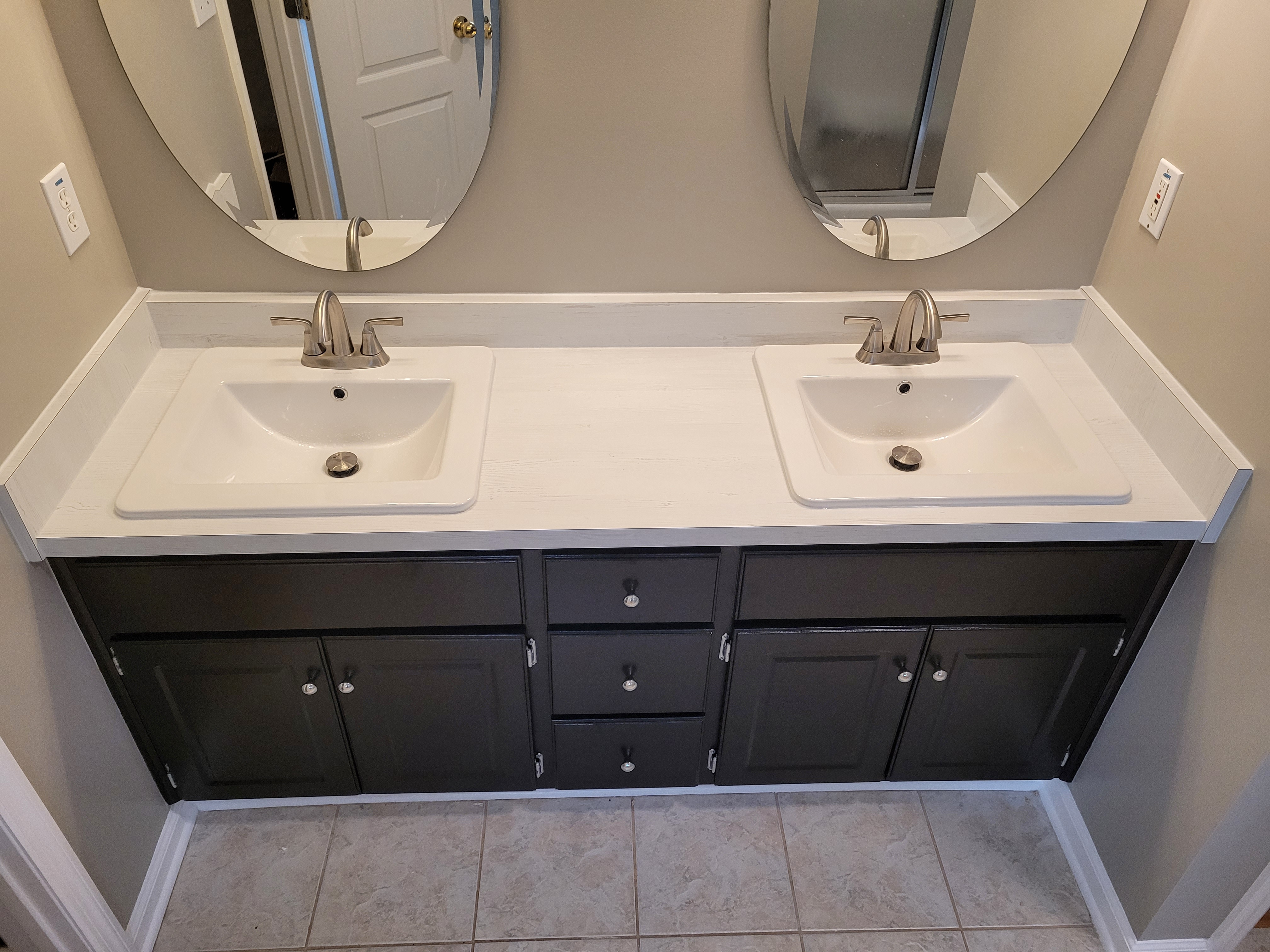 Updated bathroom vanity with modern, square sinks